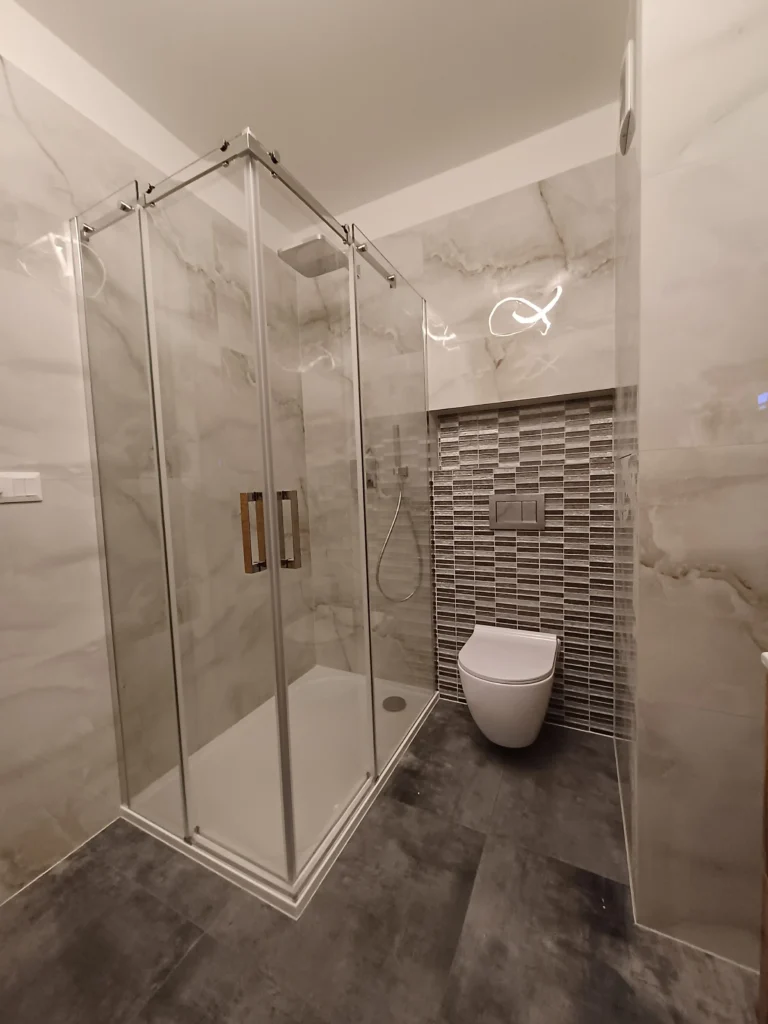 Rekonstrukce koupelny a WC v bytě Praha 11