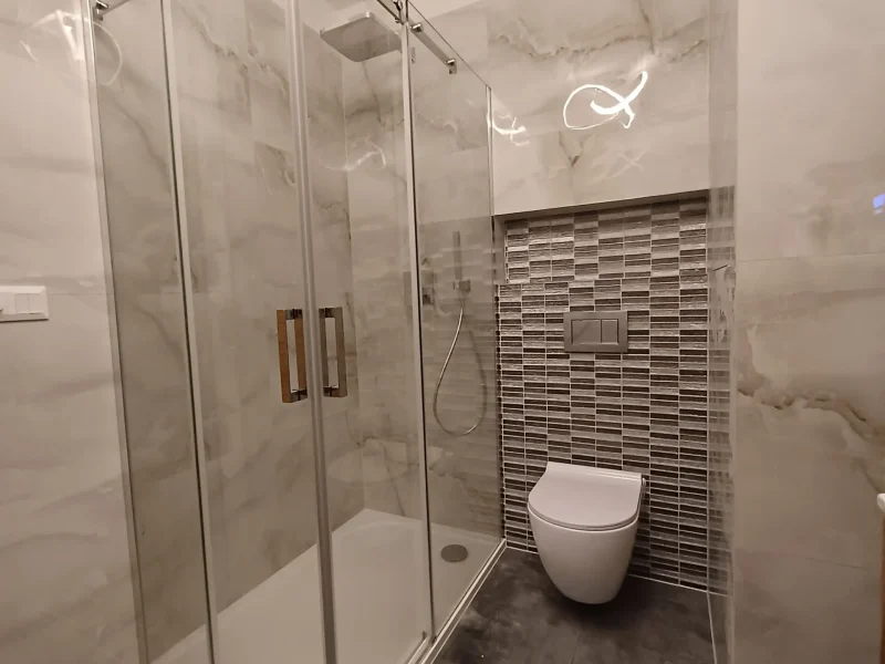 Rekonstrukce koupelny a WC v bytě Praha 11